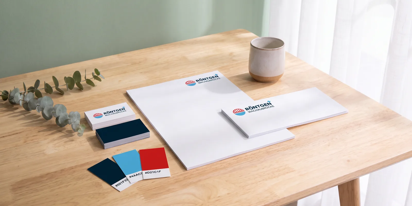 Branding: Briefpapier, Kuvert und Visitenkarten von Röntgen Wachaubrücke mit Farbkarten